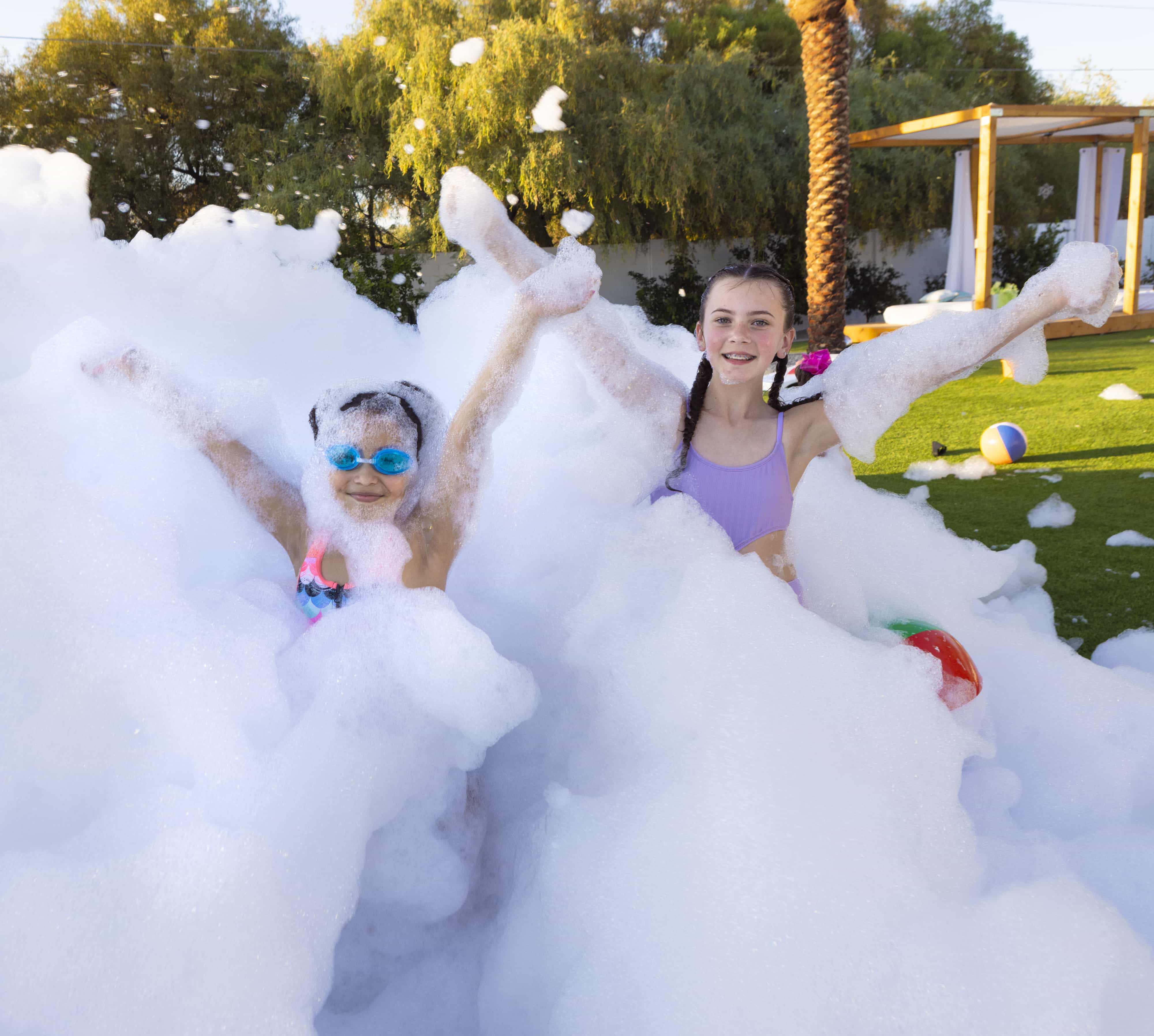 Kids having fun with foam at a party in Conshohocken PA.