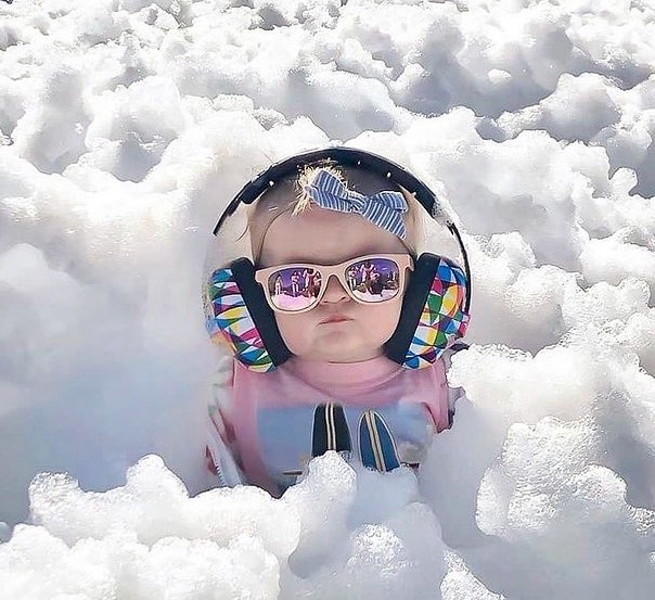 Baby having fun with foam in Montgomery County, PA.